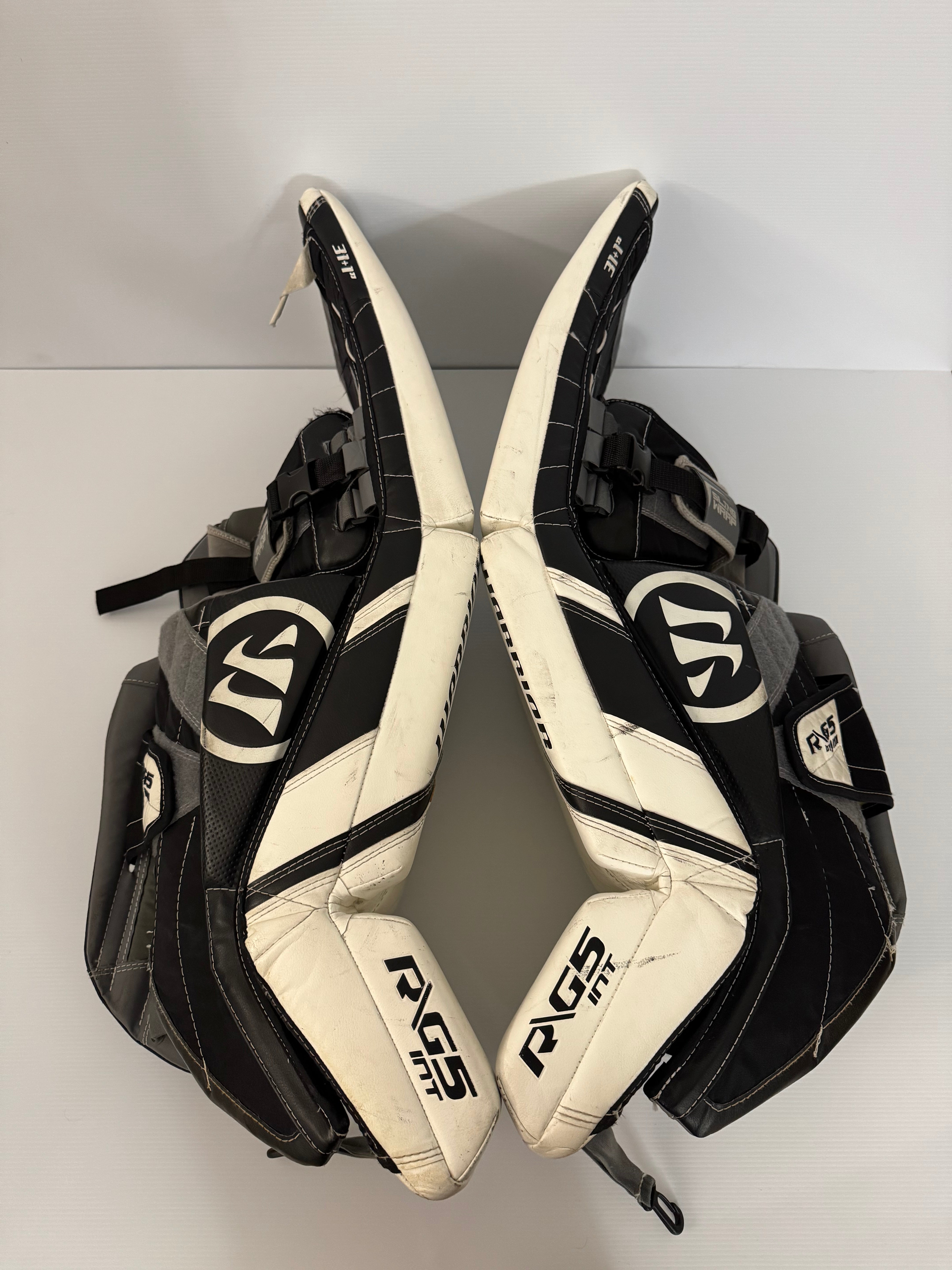 Used Intermediate 31" + 1" Warrior Ritual G5 Goalie Leg Pads White/Black