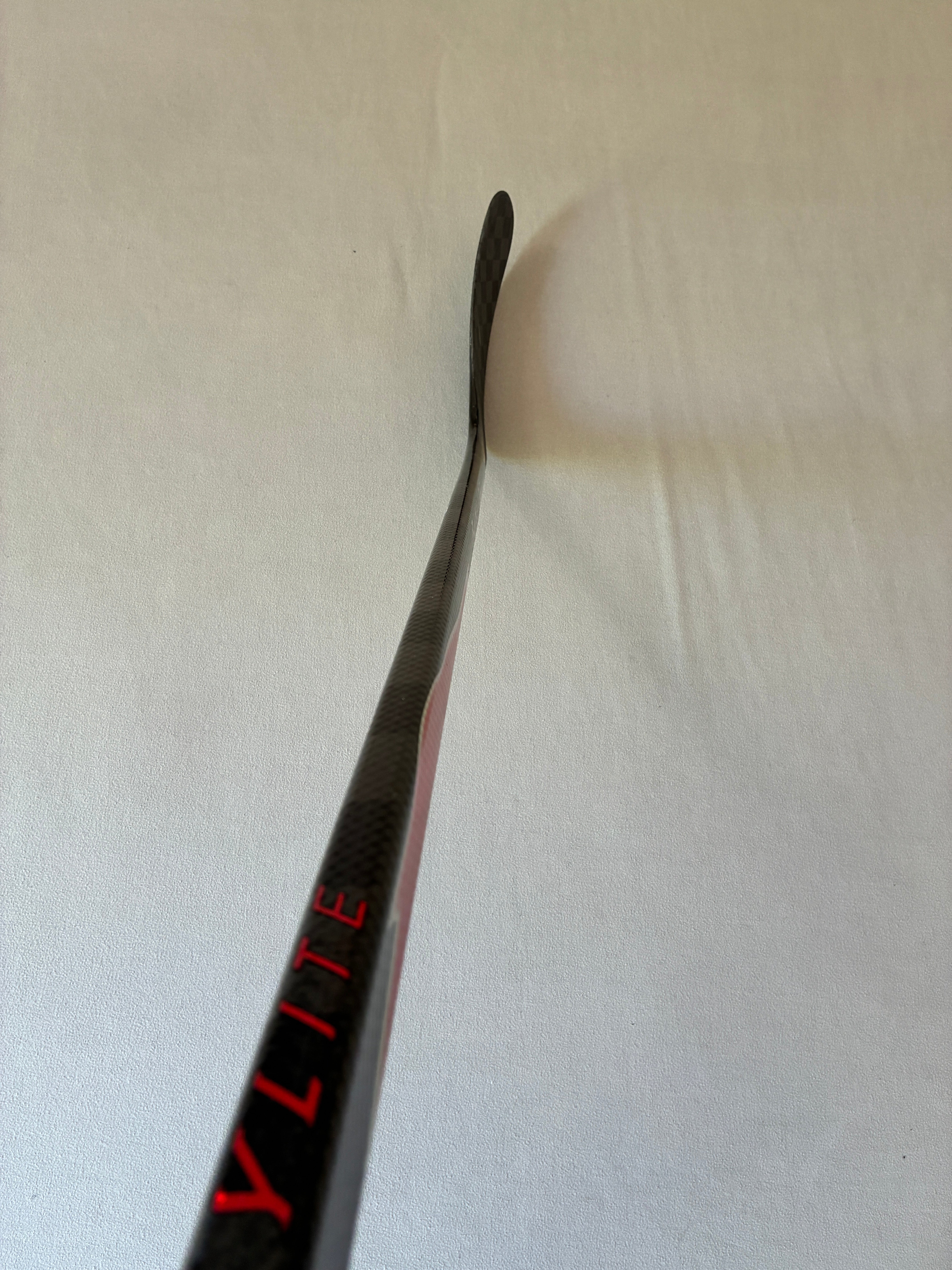New 77 Flex P90TM Senior Bauer Flylite Left Hand Pro Stock Hockey Stick - Red