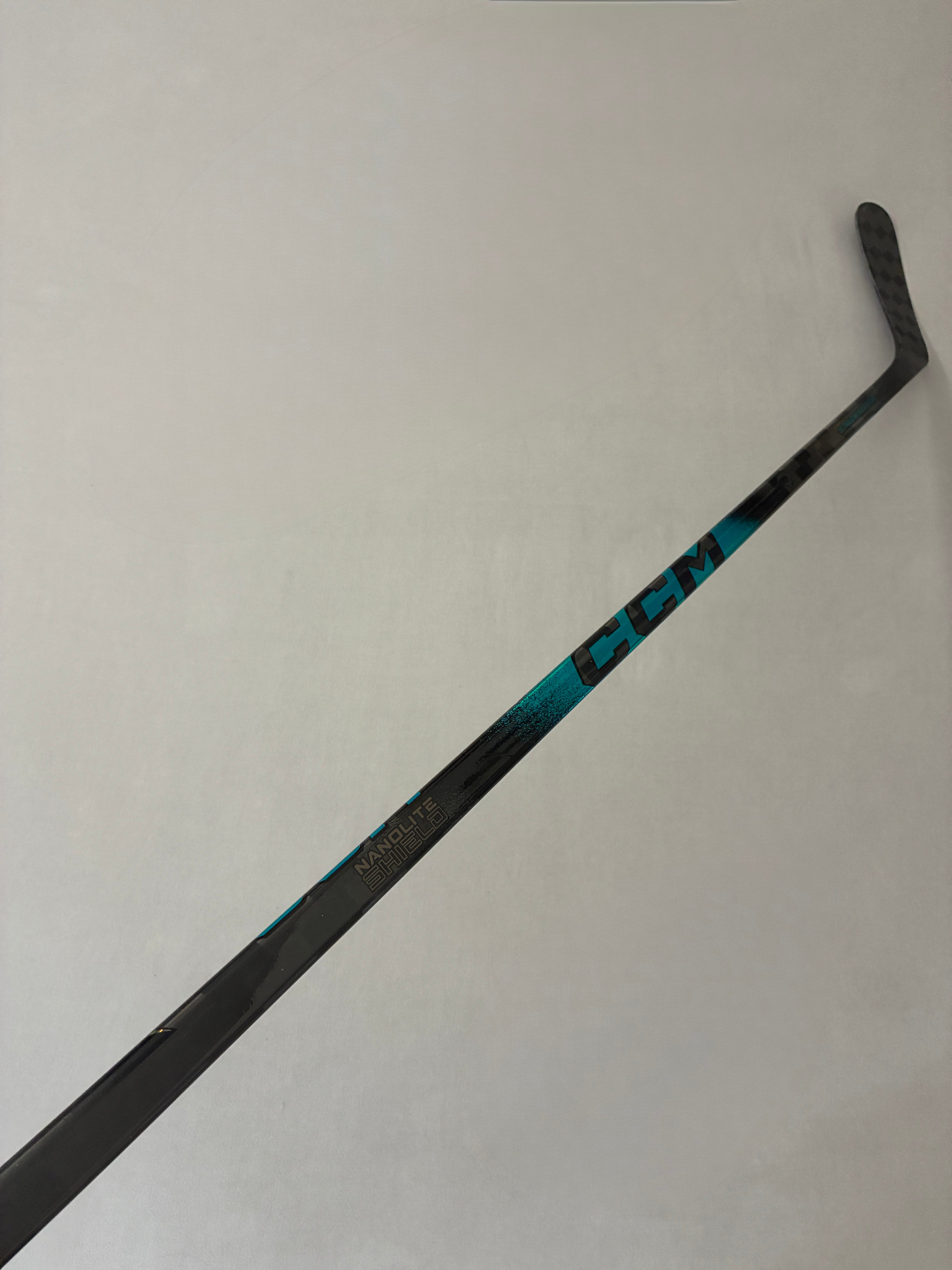 New 75 Flex P90 Senior CCM Ribcor Trigger 10 Pro Left Hand Pro Stock Hockey Stick - Turquoise