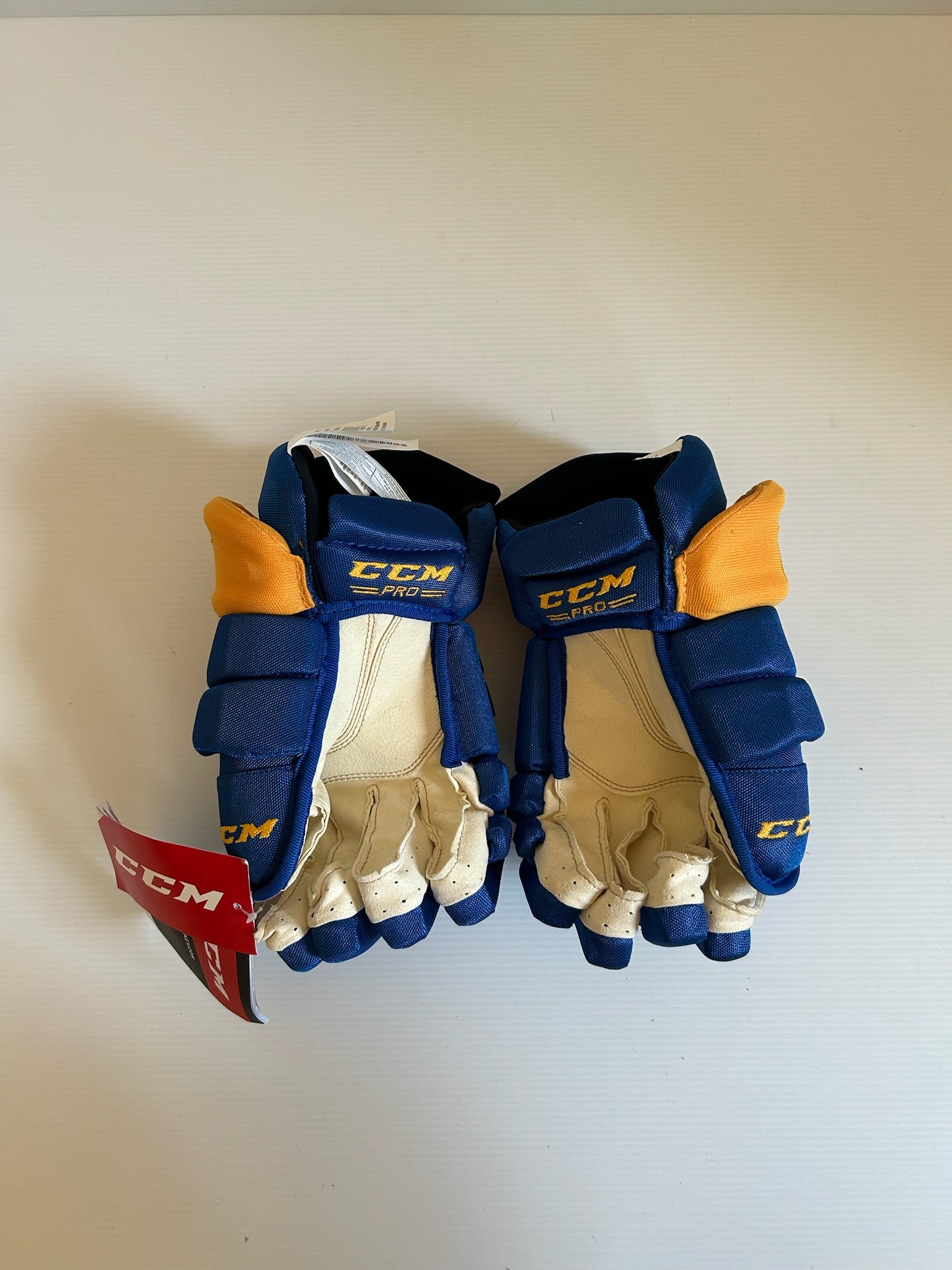 New CCM HGTKXP 13" Hockey Gloves - Royal/Gold (NHL)