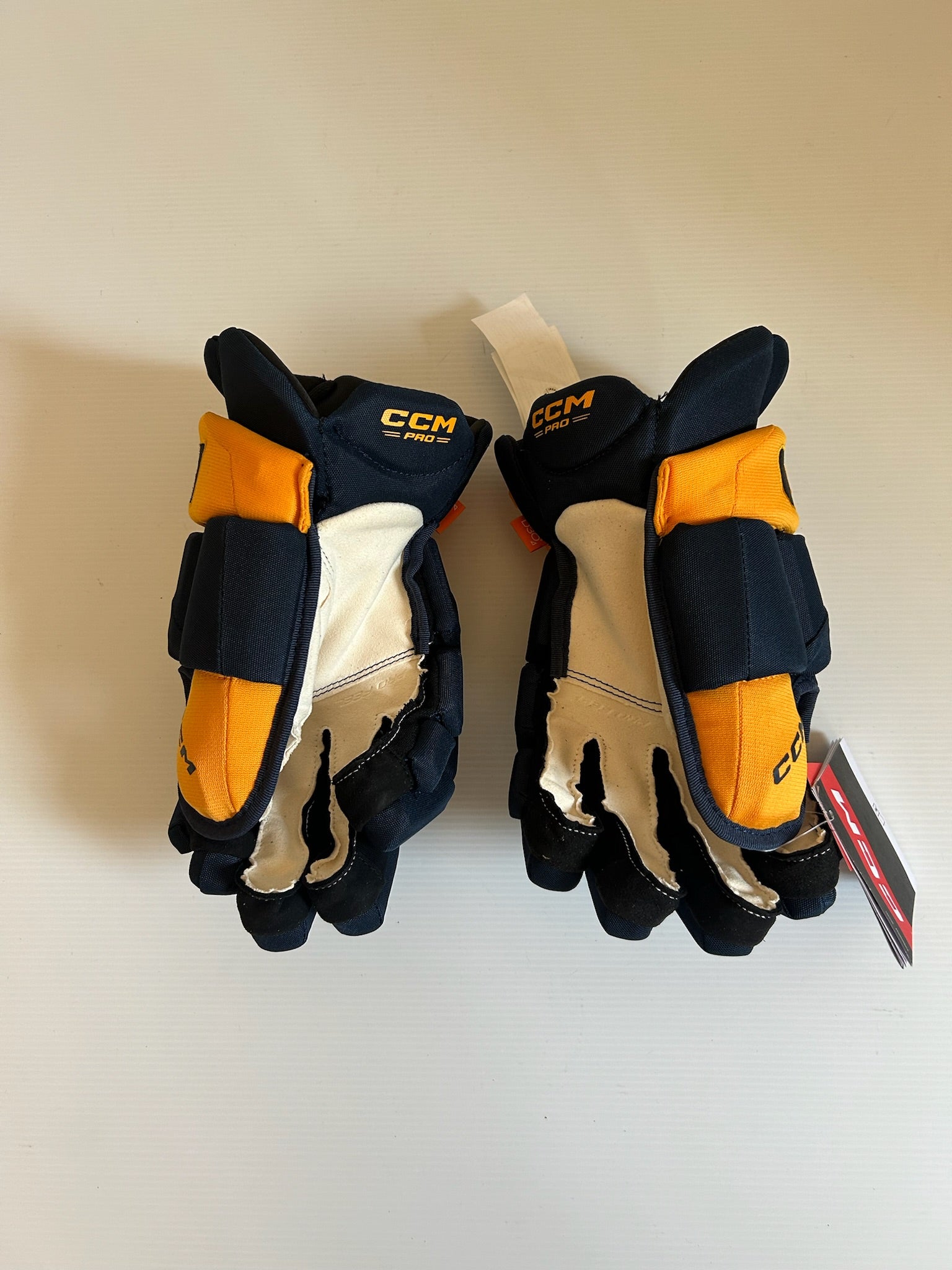 New CCM HGPJSPP 14" Hockey Gloves - Navy/Gold