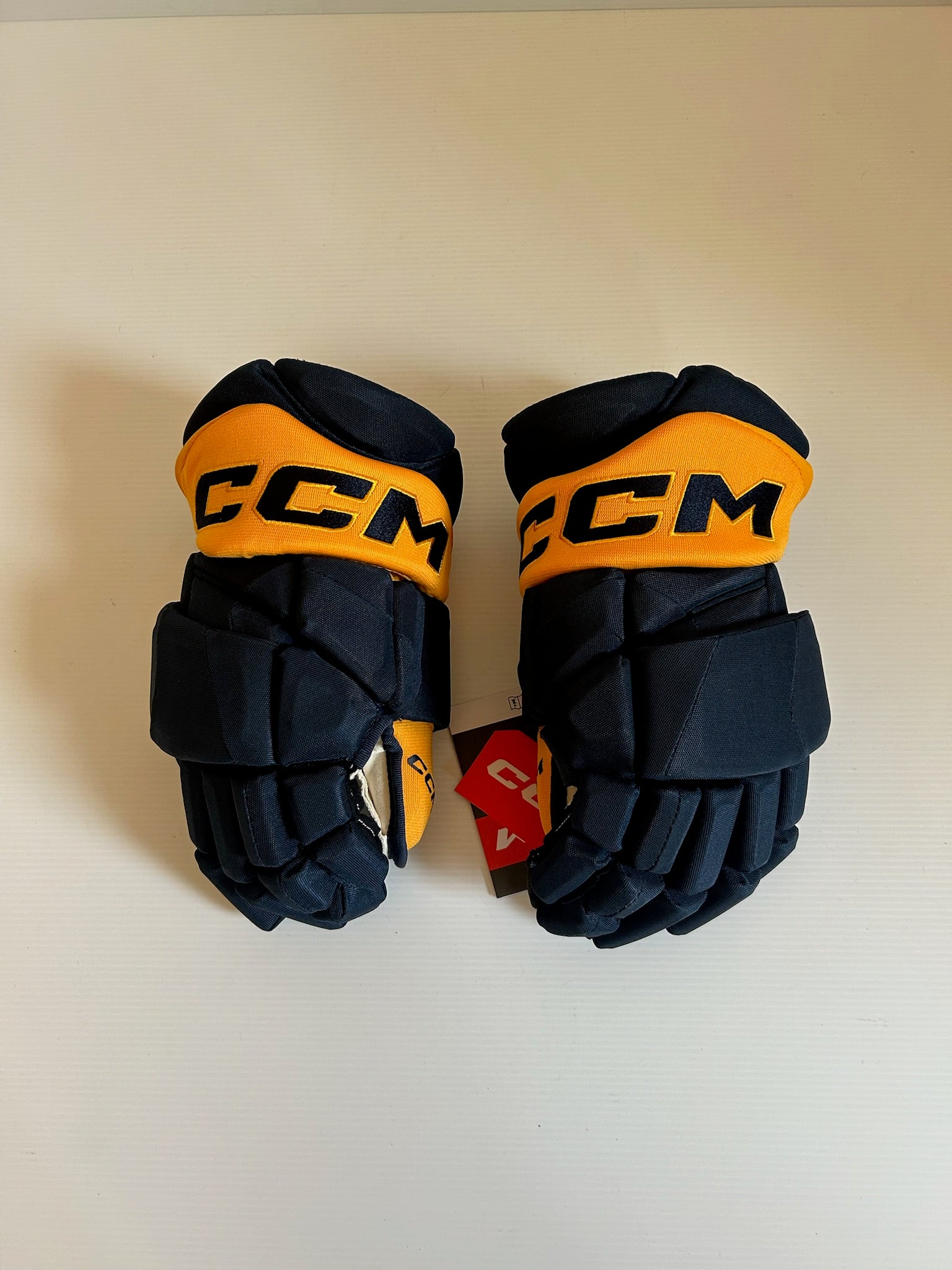 New CCM HGPJSPP 14" Hockey Gloves - Navy/Gold