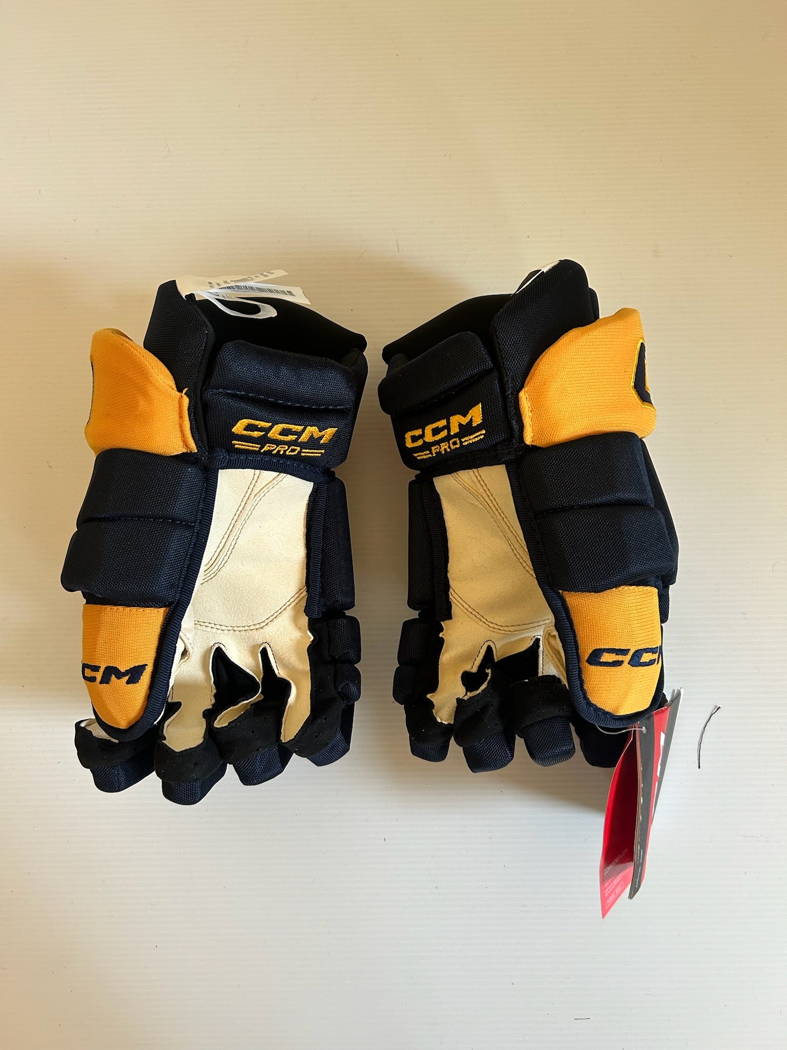 New CCM HGTKPP 14" Hockey Pro Stock Gloves - Navy/Gold