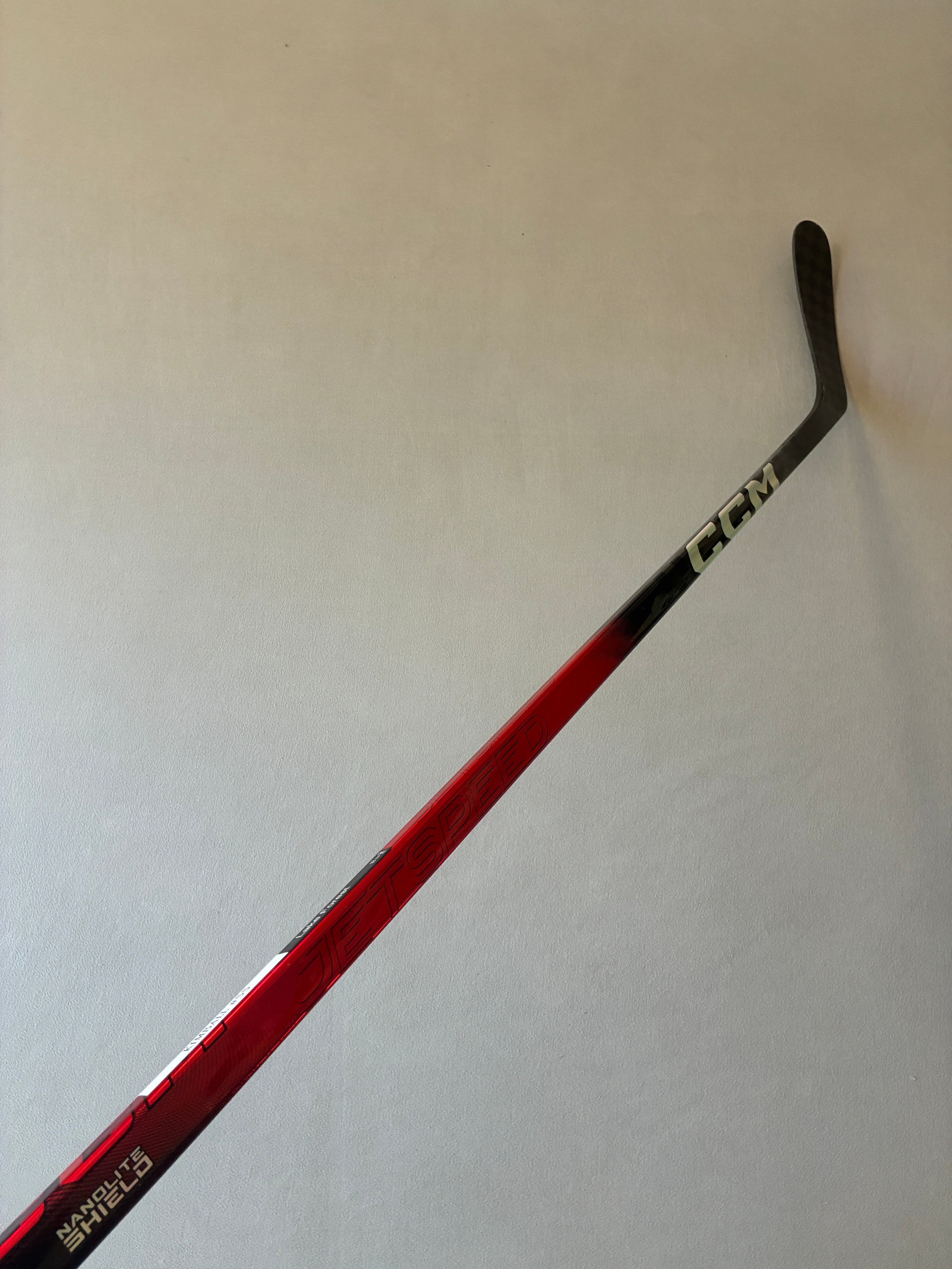 New 85 Flex P90 Senior CCM Ribcor Team (Jetspeed dress) Left Hand Pro Stock Hockey Stick - Red
