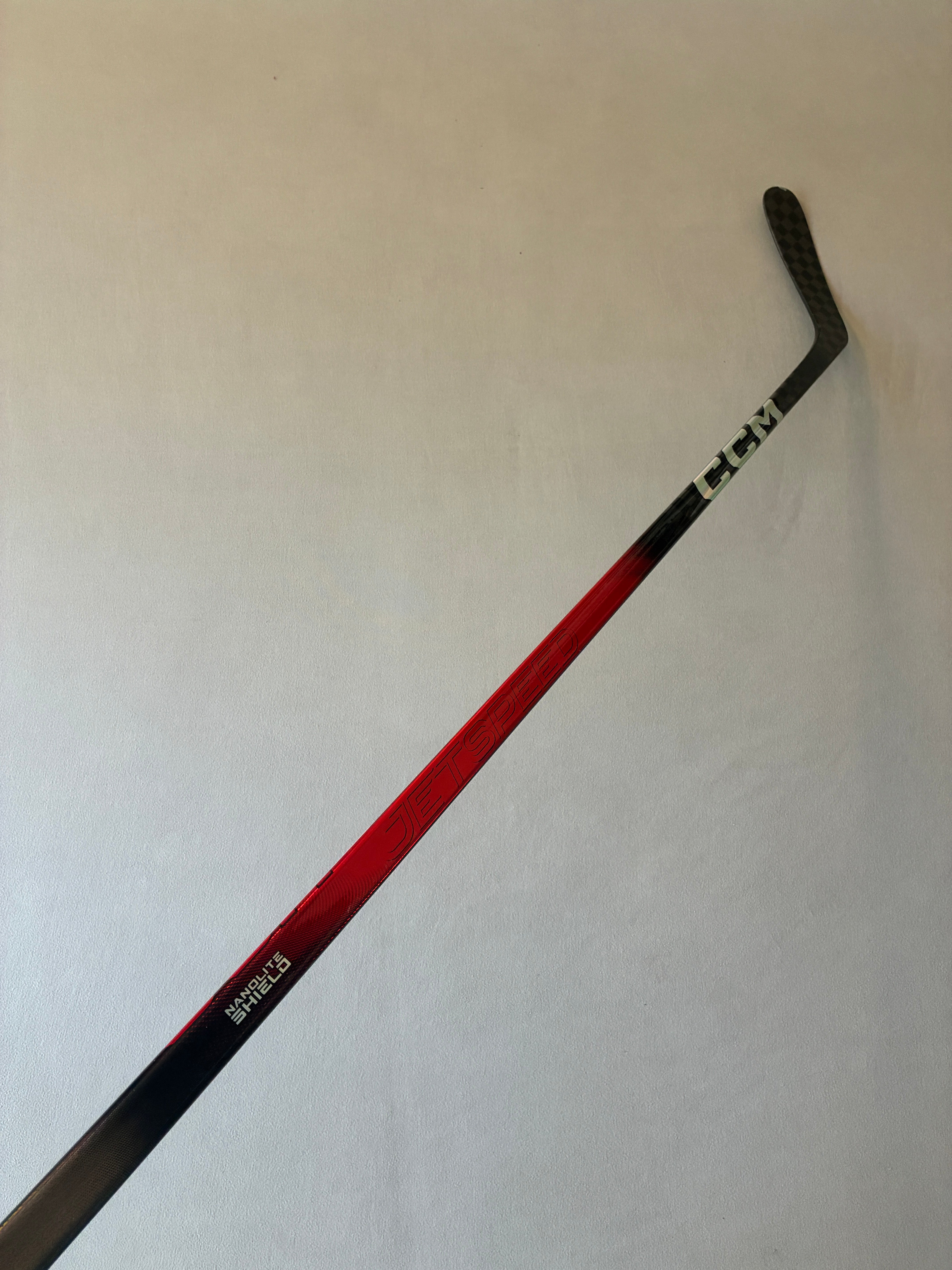 New 95 Flex P29 Senior CCM Ribcor Team (Jetspeed dress) Left Hand Pro Stock Hockey Stick - Red