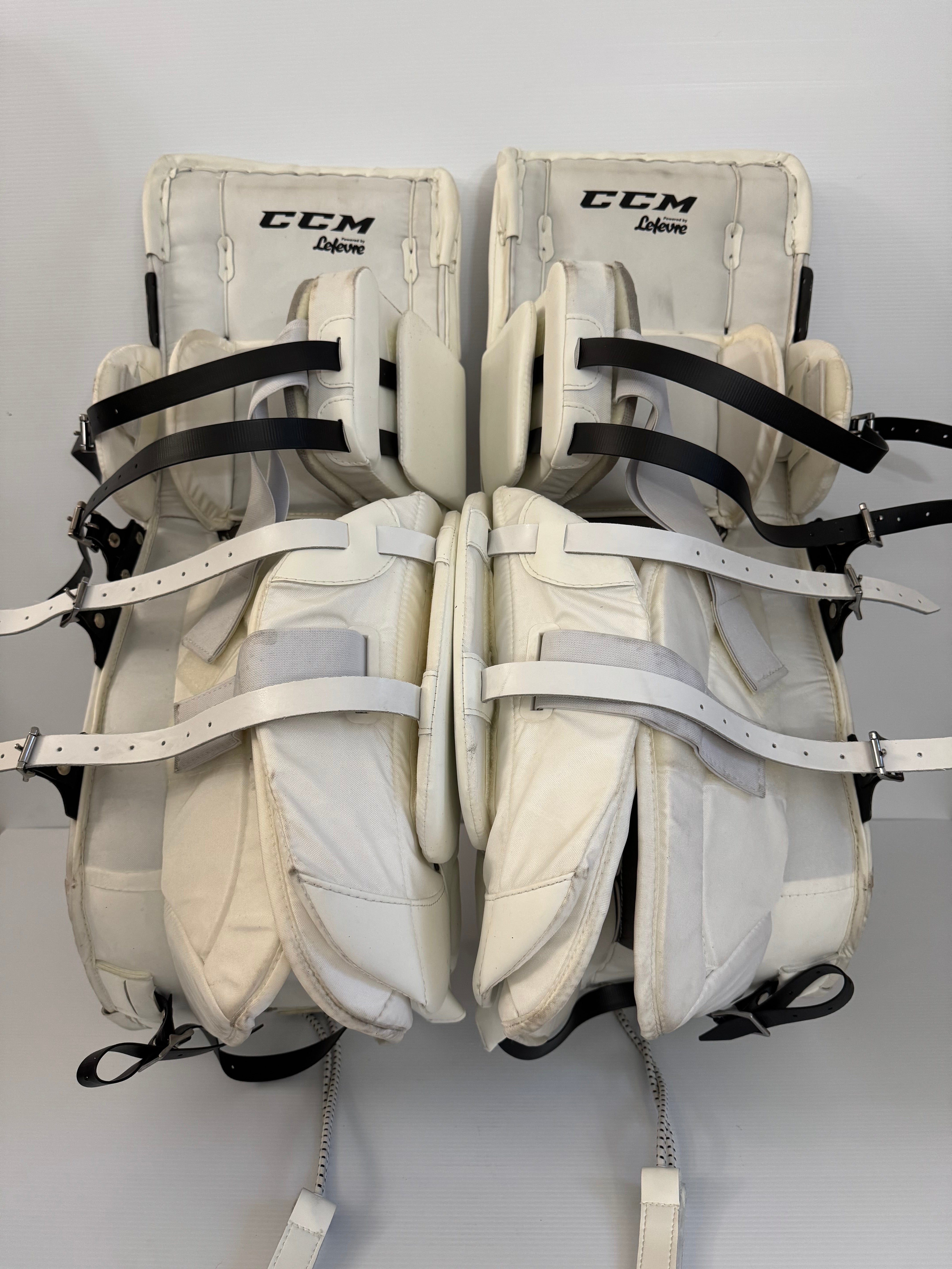 Used CCM Pro Stock Extreme Flex III Leg Pads 32+1 – Black/Gold/White (NCAA)