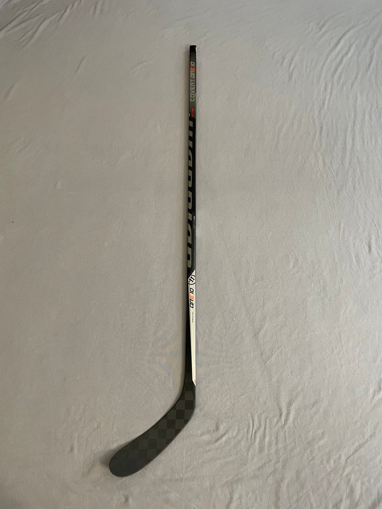 Like New (Demo) Senior/Intermediate Warrior Covert QRE10 Hockey Stick (Black/Silver Model)